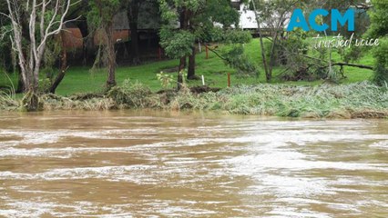 More rain forecast after town flooded, roads cut