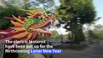 Giant dragon lanterns light up Buddhist temple in Malaysia