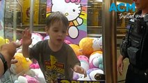 'Top prize': Kid gets himself stuck in a supermarket claw machine