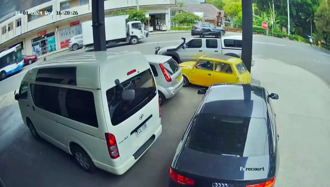 Alleged attacker held by bystanders after stabbing