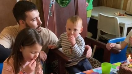 Toddler tries to take a big bite of his birthday cake *Hilarious Reactions*