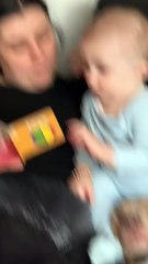 Baby Uses Dog's Head As a Chair