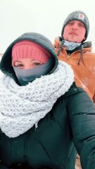 Tandem Sled Frosts Lashes In Snow