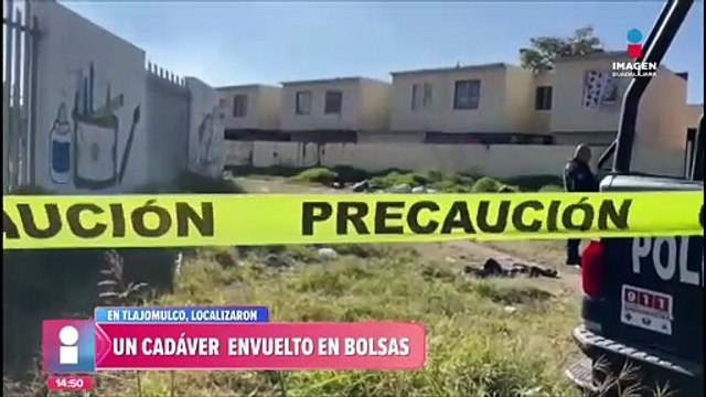 Detrás de una primaria, encuentran cadáver maniatado en bolsas de plástico
