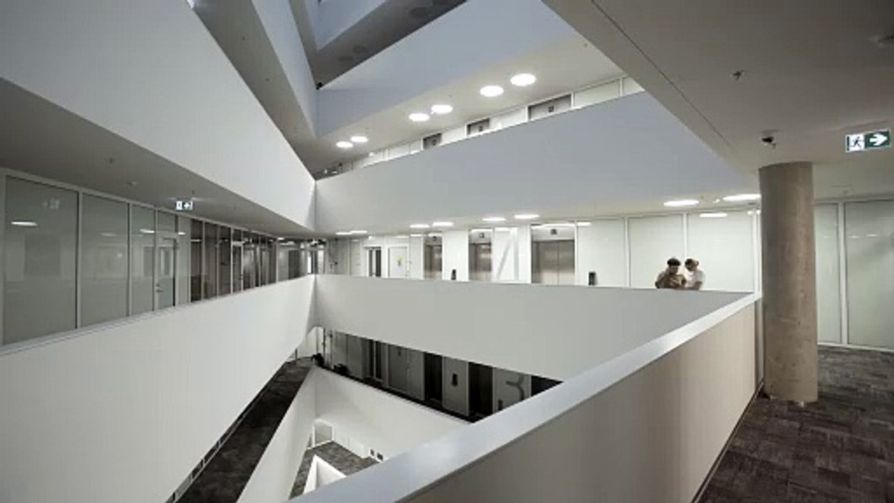 corporate-workers-in-modern-architecture-interior stock footage