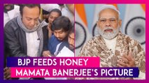 BJP Members Feed Honey To Mamata Banerjee’s Picture For Her Offensive Remark On PM Narendra Modi