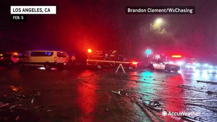 Floodwaters damage California homes, block roads