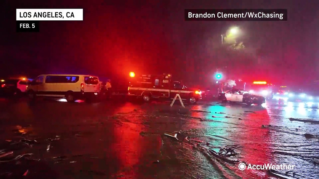 Floodwaters damage California homes, block roads