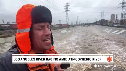 Los Angeles River rages amid atmospheric river