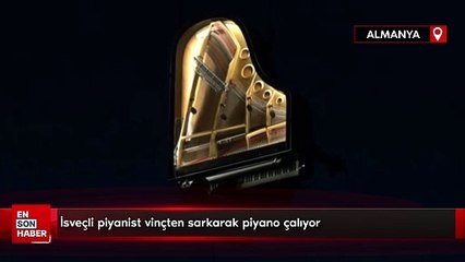 İsveçli piyanist vinçten sarkarak piyano çalıyor