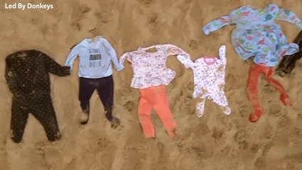 Watch: Children’s clothing stretching 5km laid out on beach in Gaza war protest