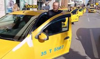 İzmir'de aracına aldığı kişinin silahla öldürdüğü taksici Oğuz Erge'nin meslektaşları yürüyüş yaptı