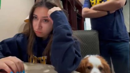 Family erupts with joyous astonishment following girl's University of Michigan acceptance