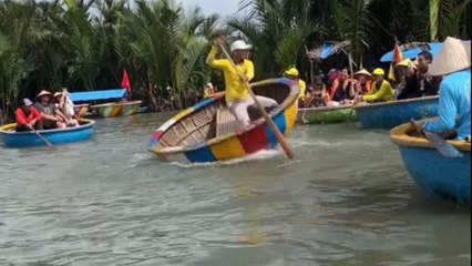 Woman tackles a circular boat adventure in Vietnam's coconut grove