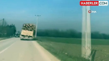 Tomruk yüklü kamyonetin tehlikeli yolculuğu kamerada