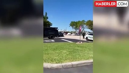 Florida'da gözaltına alınmamak için bir kadını bıçakla rehin alan soyguncu, keskin nişancı tarafından öldürüldü