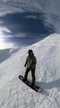 Snowboarder Catches an Edge and Tumbles Down Steep Slope