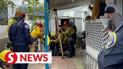 Woman pulled from 25-feet hole in Fontana, California