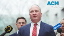 Nationals frontbencher Barnaby Joyce filmed mumbling into phone while lying on ground