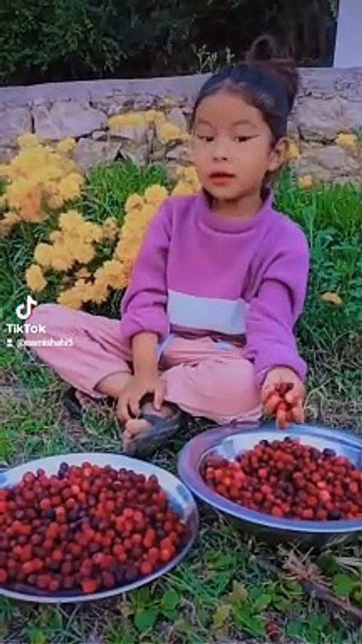Little baby and Berry fruit