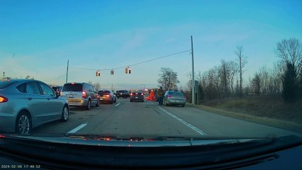 Man Unloads Shopping Cart From Road Shoulder