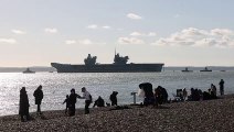 Royal Navy HMS Prince of Wales leaves Portsmouth after departure delayed