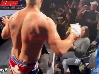 Cody Rhodes throws a beer in Dominik mysterio face at WWE Supershow