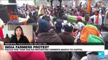 Indian police fire tear gas as protesting farmers march to capital