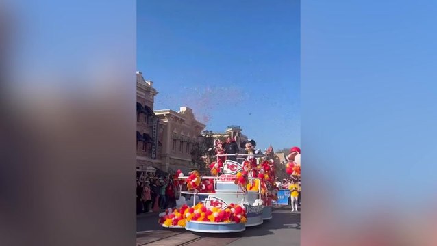 Patrick Mahomes waves to crowds with Mickey Mouse at Disneyland after Super Bowl win