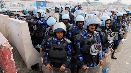 Police in India shoot tear gas at farmers protesting for better crop prices