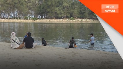 Pantai tumpuan keluarga ketika cuaca panas