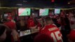 Excited KC Chiefs fans blow the roof off of a pub after their team wins Super Bowl 58