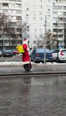 Ded Moroz on an electric unicycle