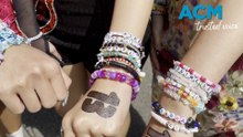 Taylor Swift fans exchange friendship bracelets