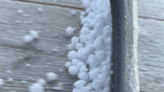 Man discovers the art of collecting inedible Dippin' Dots while scraping snow off of table