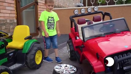 Kids playing with monster Cars and Jeeps