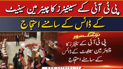 PTI senators protest in front of Chairman senate's dais