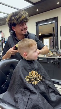 Kid Laughs Uncontrollably While Getting a Haircut