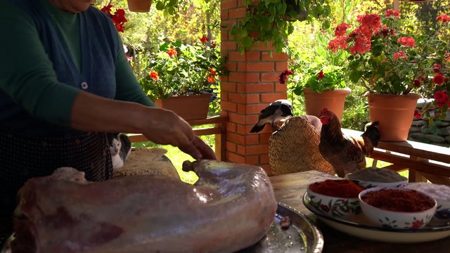 Old Style Cooking Lamb in Underground Tandoor