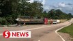 Lorry driver killed after trailer crashes into road shoulder in Kluang