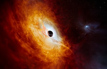 The brightest and hungriest black hole ever has been spotted in the distant universe