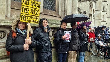 Julian Assange supporters gather outside High Court