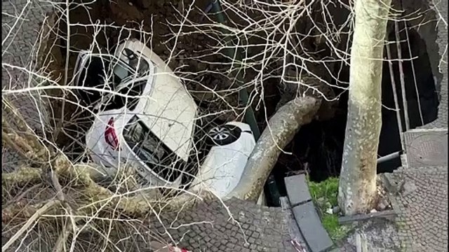 Two cars swallowed in Naples sinkhole