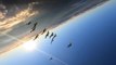 Group of Skydivers Fly in Formation During Sunset