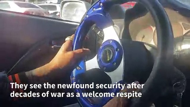 Drifting with purpose: Sports car enthusiasts rally in Afghanistan