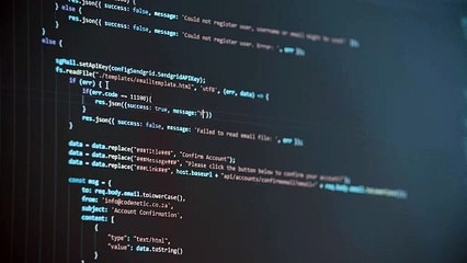 A computer monitor flashing digital information