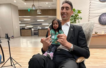 The world's tallest man and shortest woman have been reunited in California