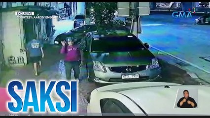 Lalaking na-huli cam na nagbukas at tumangay sa computer box ng isang kotse, tinutugis | Saksi