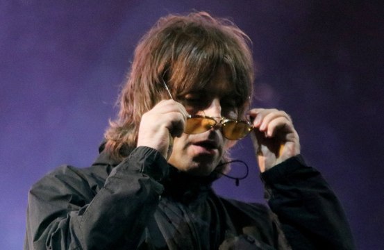 Liam Gallagher has been branded a wind-up after he appeared to confirm he will play Glastonbury with John Squire