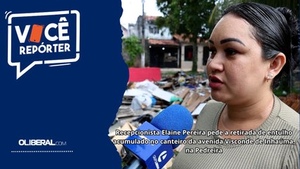 Recepcionista Elaine Pereira pede a retirada de entulho acumulado no canteiro da avenida Visconde de Inhaúma, na Pedreira